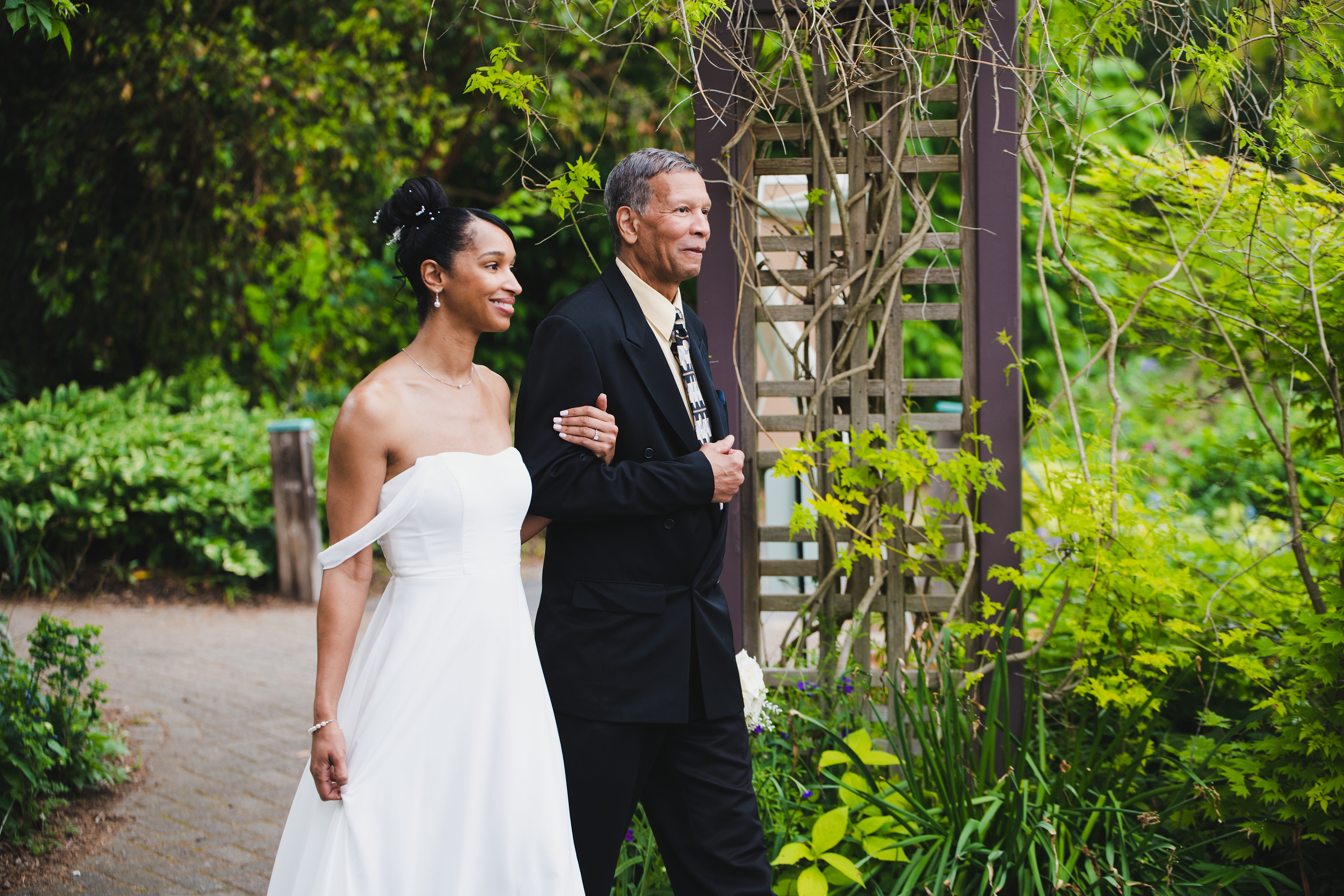 Brittany walking down the aisle with her father