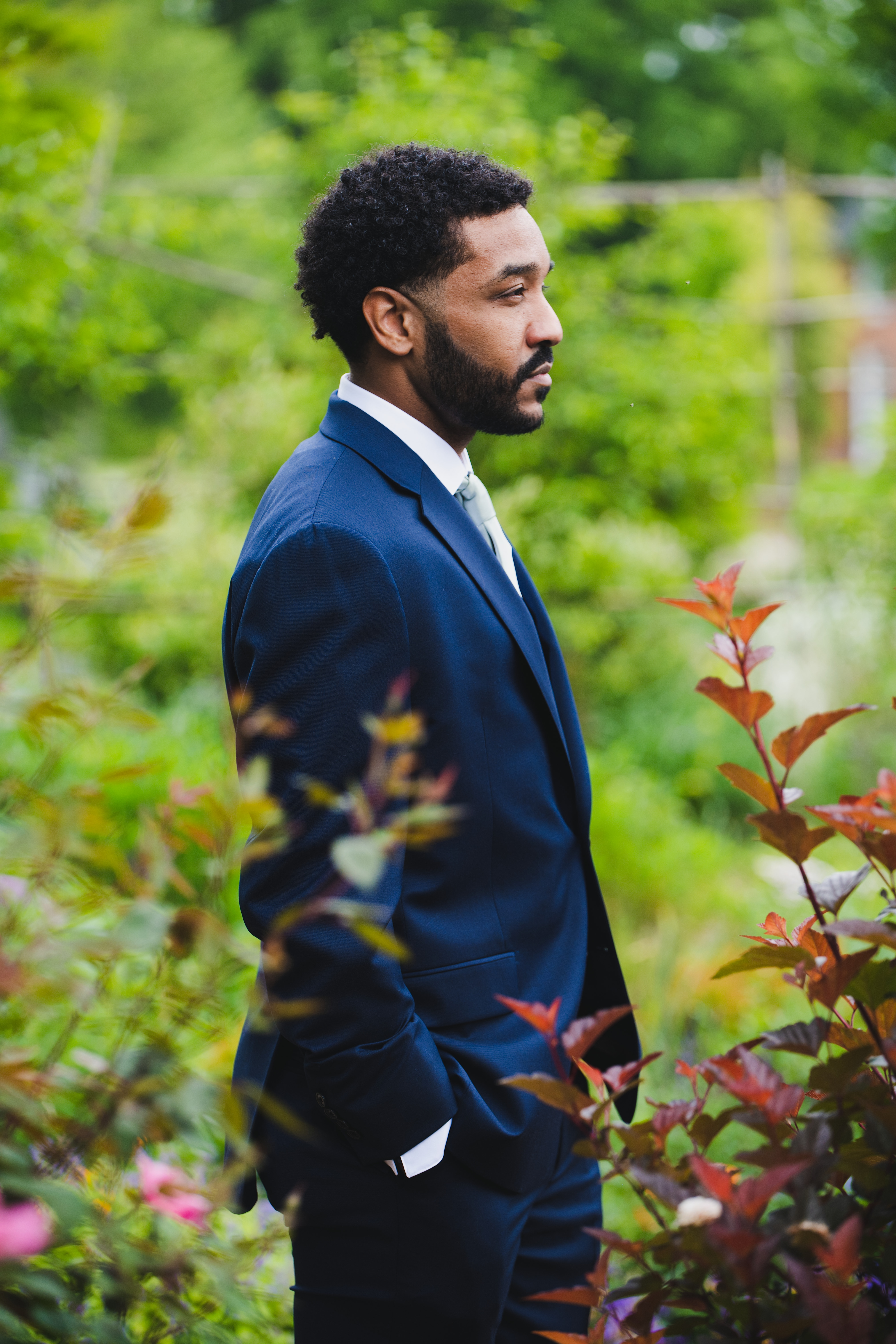 Eric before the ceremony, contemplative in the garden