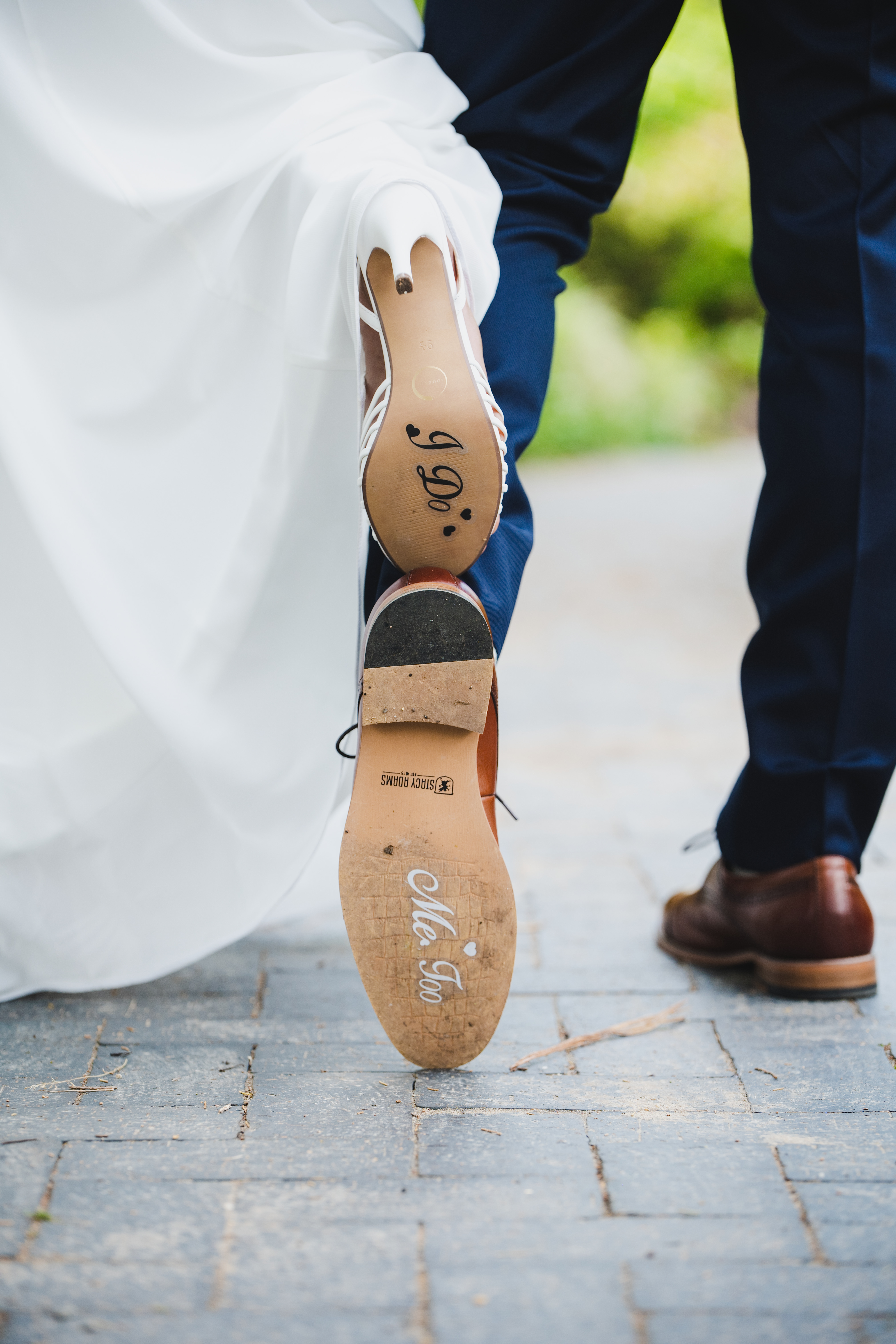 I Do and Me Too on the bottom of their shoes